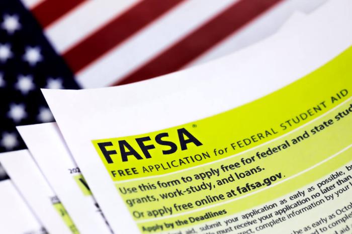 free application for student aid form on a background of american flag
