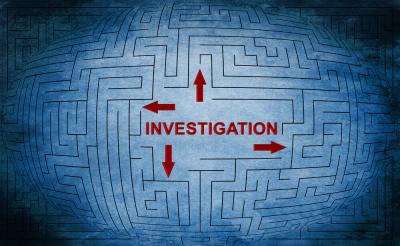 the word investigation in red with arrows on a light blue maze background