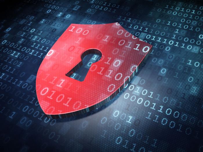 red shield with keyhole on blue technology background
